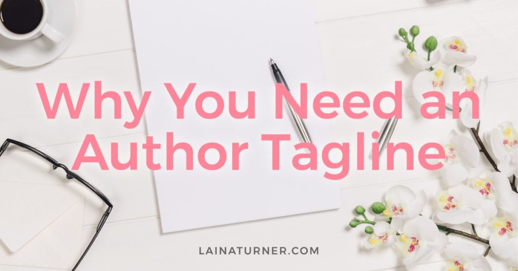 Dogwood flowers frame an empty notepad and pen with the post title, 'Why You Need an Author Tagline by Laina Turner' superimposed on the photo.