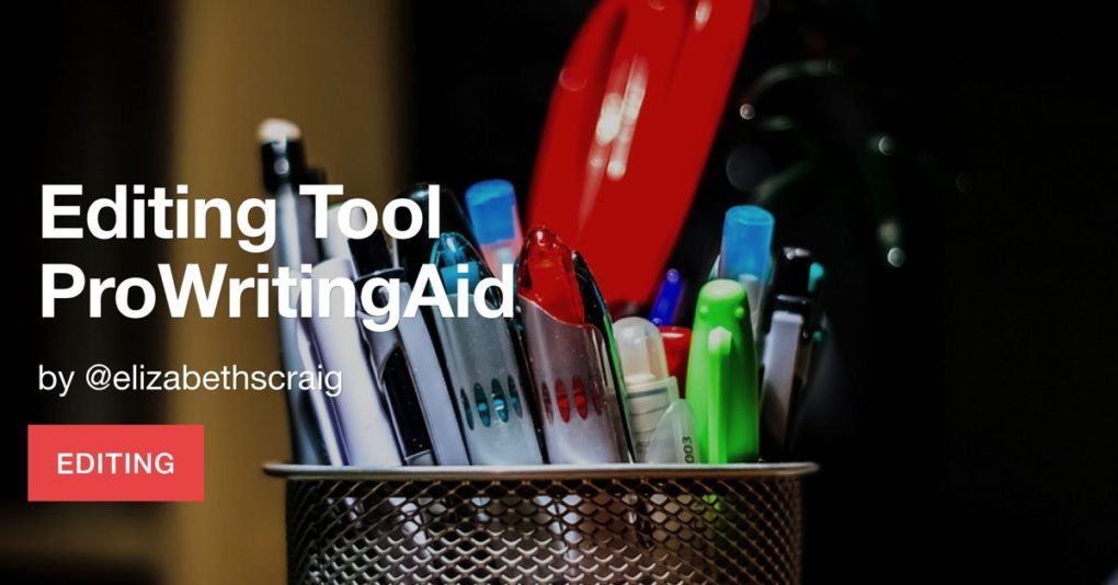 Pens and a pair of scissors in a metal basket.